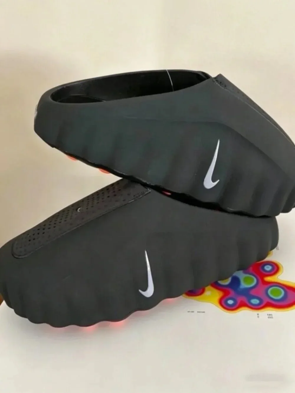 Nike Black Slide Sandals with Orange Pod Accents